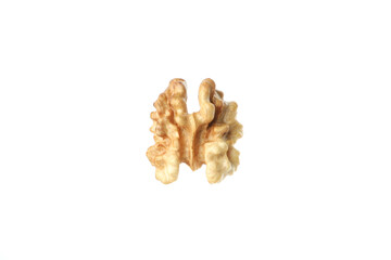 Peeled walnuts isolated on white background, close up