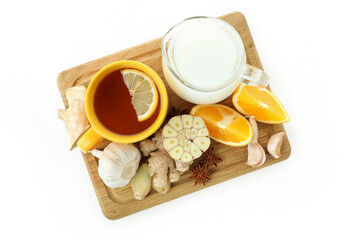 Concept of treatment colds with honey and garlic isolated on white background