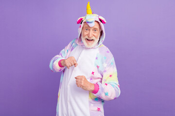 Photo of crazy funky retired man nightwear overall smiling dancing isolated purple color background