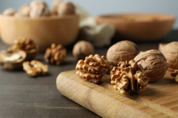 Concept of healthy food with walnuts on wooden table