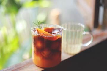 homemade orange Americano coffee from free time making drink for healthy living life. selective focus