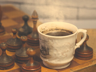 Black coffee and vintage chess, retro