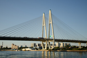 Modern road Vantovyi bridge across the river. Summer travel concept