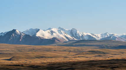 Snow-covered peaks of Kyrgyzstan's majestic mountain ranges.