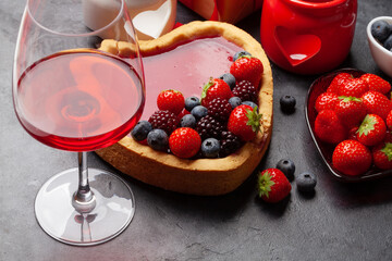 Heart shaped sweet cake with berries