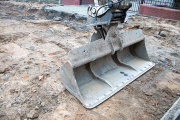 
excavator shovel at construction site