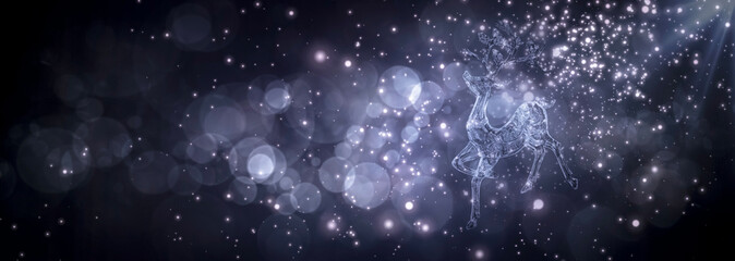 Abstract light circular bokeh background with christmas reindeer. New year conceptual postcard.