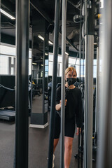 Fototapeta na wymiar Fitness,sports.fit,Girl in mask fitness gym opening lockdown covid passport,QR cod Wellness, health care,generation z sports recreation concept online fitness apps. workout,training,Fit wellness