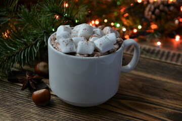 Obraz na płótnie Canvas Cup of hot chocolate or cocoa with marshmallows. Cozy winter holidays and Christmas