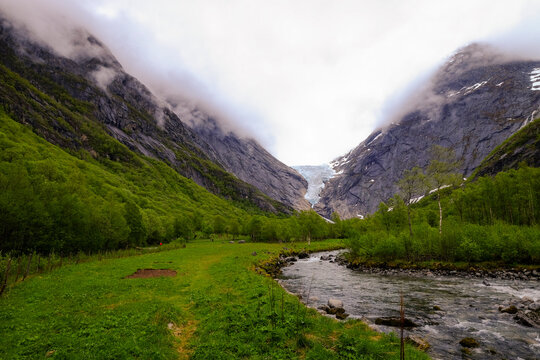 A glacial stream flows from the Briksdal glacier, Stryn, Vestland, Norway, Scandinavia