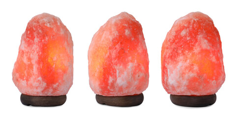 Set with pink Himalayan salt lamps on white background. Banner design