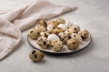 Quail eggs in shell on plate