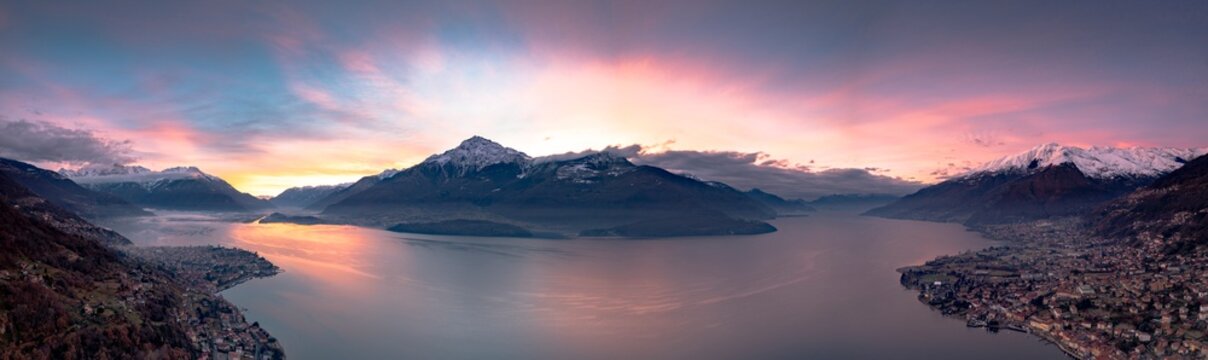 Aerial panoramic view of Gravedona and Domaso towns on shores of Lake Como at sunrise, province of Como, Lombardy, Italian Lakes, Italy