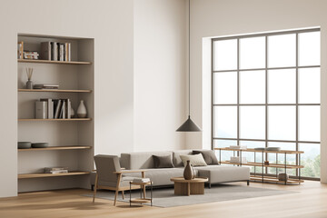 Bright living room interior with large sofa, armchair, panoramic window