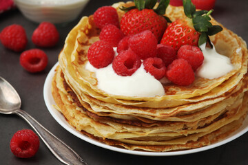 Russian cuisine national dish bliny with fresh berries