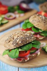 Homemade sandwiches with ham and vegetables