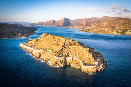 Aerial view of Spinalonga island Venetian fortress and Mirabello bay at dawn, Lasithi prefecture, Crete, Greek Islands