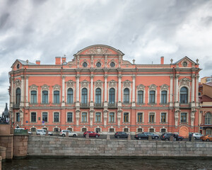 Fototapeta na wymiar Palace in the style of Russian Neo-Baroque on Nevsky Prospect. Facade of the palace on the Fontanka embankment