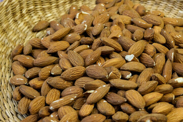 Almonds, the edible seeds of Prunus dulcis. Healthy eating and vegetarian concept.