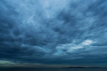 Fototapeta na wymiar Dark clouds before a thunder-storm