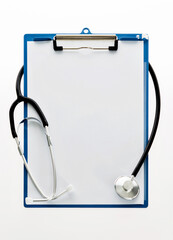 Stethoscope and clipboard on white background