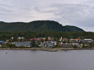 Fototapeta na wymiar View of small remote village Bella Bella, part of Indian Reservation of Heiltsuk First Nation, on Campbell Island on the Lama Passage, BC, Canada.