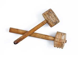 Old wooden meat hammers isolated on white background