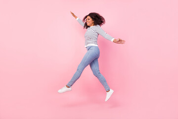 Full body profile portrait of pretty satisfied person look empty space isolated on pink color background
