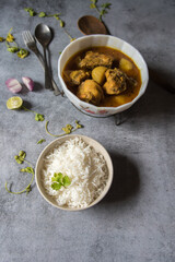 Popular Indian meal rice and chicken gravy. Top view.
