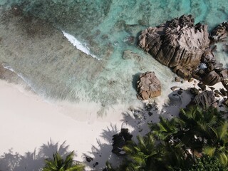 Relaxing On One of the numerous beaches in Seychelles, clean water, blue skies On a Sunny day