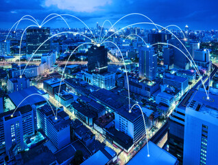 Smart city dot point connect all around, connection technology concept. Bangkok city background at night with big data in the world, Top view.