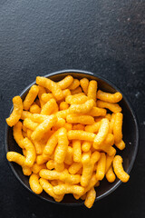 corn sticks cheesy taste spices cheese meal snack on the table copy space food background rustic. top view