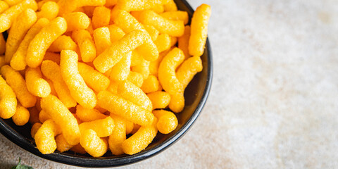 corn sticks cheesy taste spices cheese meal snack on the table copy space food background rustic. top view