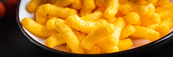 corn sticks cheesy taste spices cheese meal snack on the table copy space food background rustic. top view