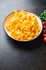 corn sticks cheesy taste spices cheese meal snack on the table copy space food background rustic. top view