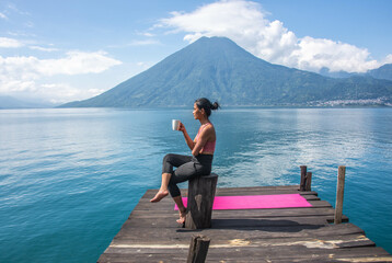 Morning coffee on the dock, San Marcos, Lake Atitlan, Guatemala.