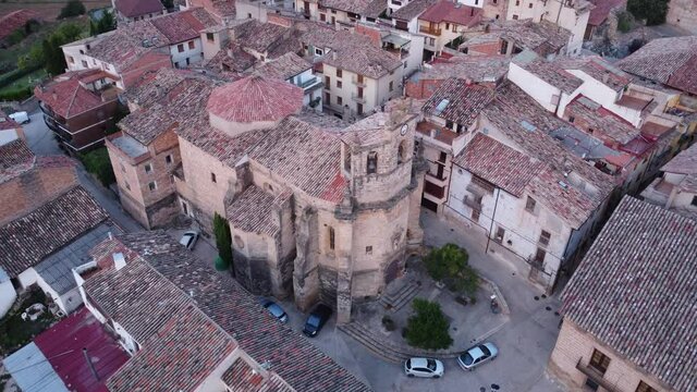 Drone flight over San Salvador church in the small village of Fuentespalda in Teruel, Spain