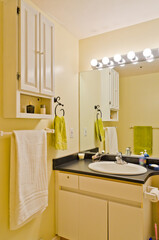 Fragment of a luxury bathroom with a towel on a hanger