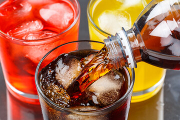 Fototapeta Pouring cola drink drinks lemonade softdrinks in a glass obraz