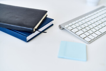 wireless keyboard on desktop cup documents office