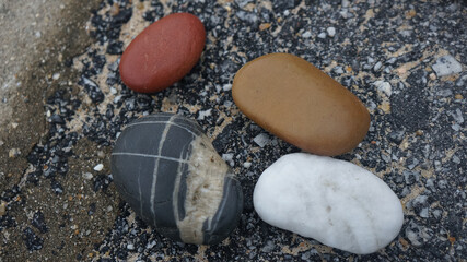 Fototapeta na wymiar Photo of beautiful stones on the closed ocean shore.