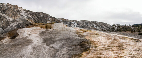 Scenic lifeless calcium terraces at Mammoth Hot Springs, Yellowstone National Park