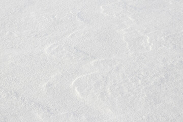 Texture of white light snow, hard snow surface