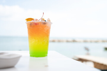 Tropical cocktail with  sea on the background,summer vacation trip