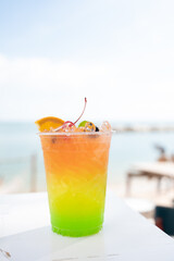 Tropical cocktail with  sea on the background,summer vacation trip
