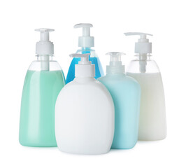 Dispensers of liquid soap on white background