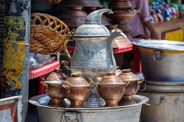 Handmade metal kettle for sell in local street market , India