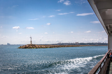 Istanbul view from a ferry while passing a breakwater from Asia to Europe on the sea of Marmara, Istanbul.