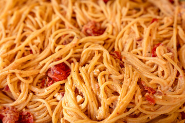 Baked tomato, basil and feta spaghetti, detail