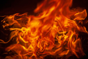 Fire flamme background as symbol of hell and eternal pain. Close up.